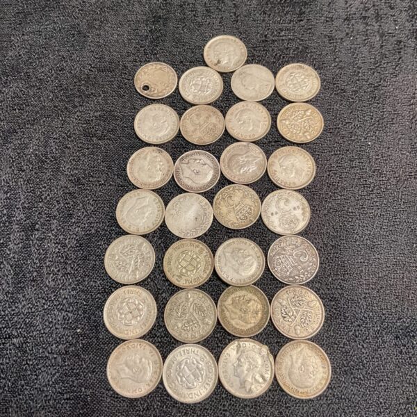 Vintage three penny bit coin collection, British pre-decimal currency.