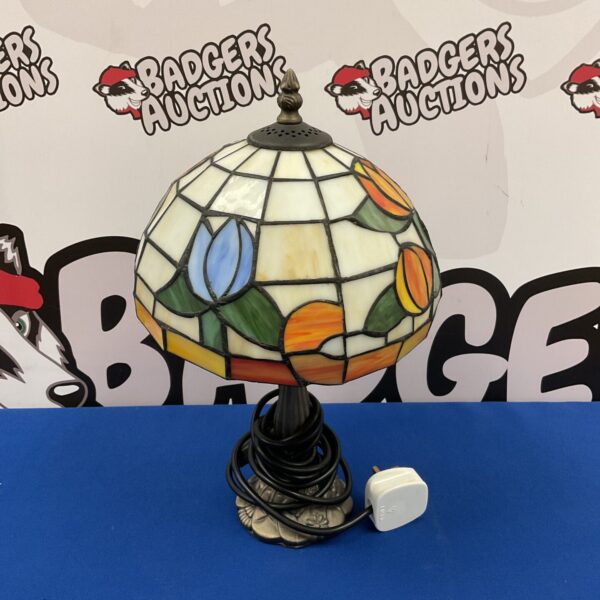 Vibrant Tiffany style table lamp with a colourful tulip shade.