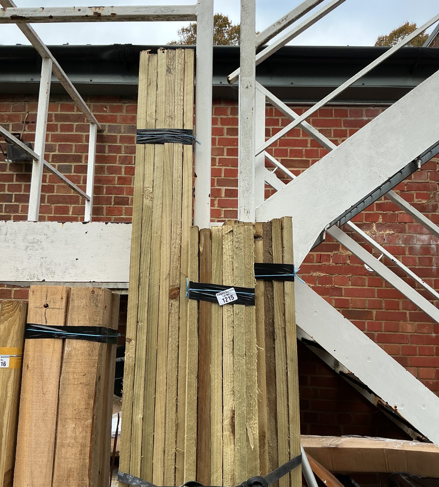 Three bundles of 7ft timber for construction and DIY projects.