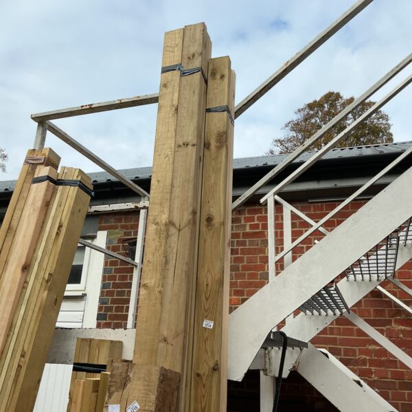 Stacked timber bundles ready for construction or DIY projects.
