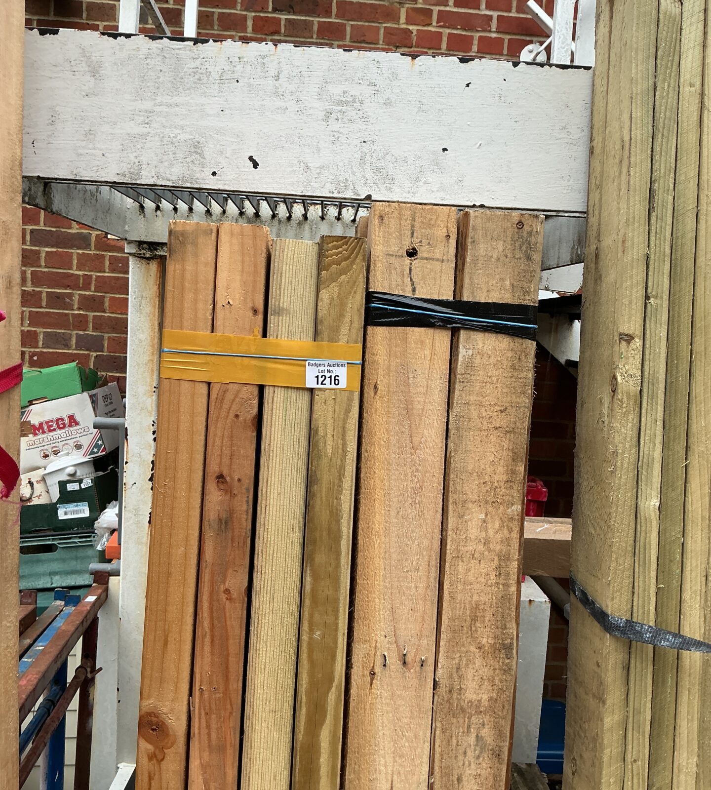 Stacked timber bundles ready for construction or DIY projects.