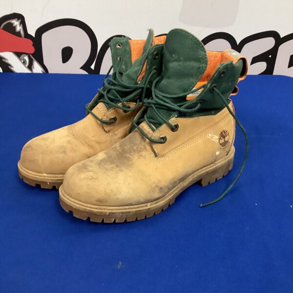 Size 6.5 Timberland boots showing wear and tear.