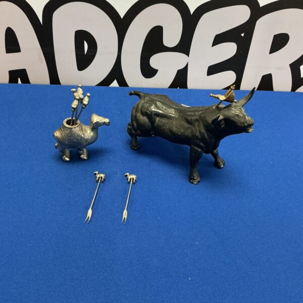 Vintage Toledo Bull Figure with camel and date picks.