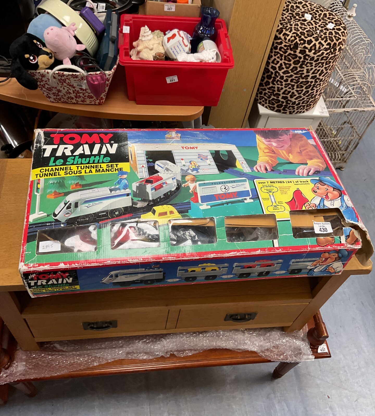 Boxed vintage Tomy Le Shuttle train set, collectible toy.