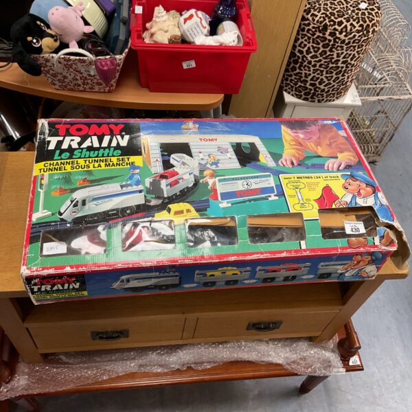 Boxed vintage Tomy Le Shuttle train set, collectible toy.