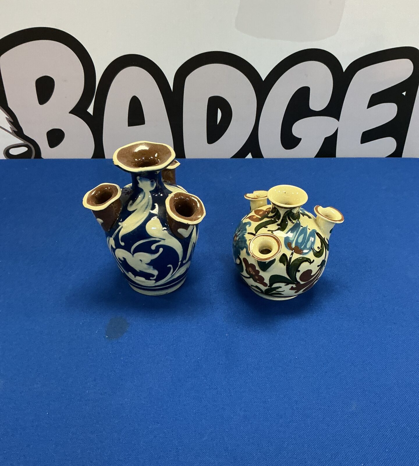 Vintage Torquay Pottery Aller Udder vase with colourful floral design.