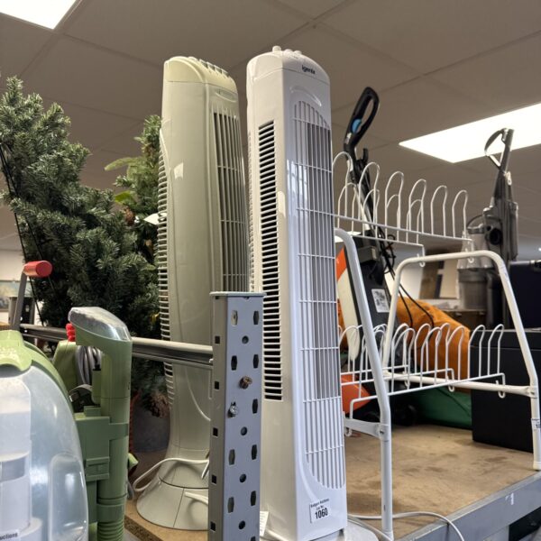 Pair of tower fans including an igenix model for home cooling.