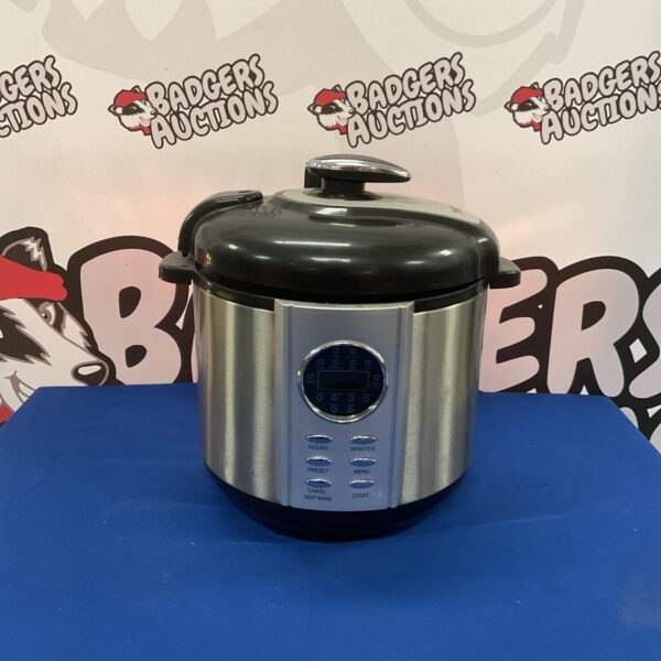 Front view of a stainless steel Tower pressure cooker with digital display.