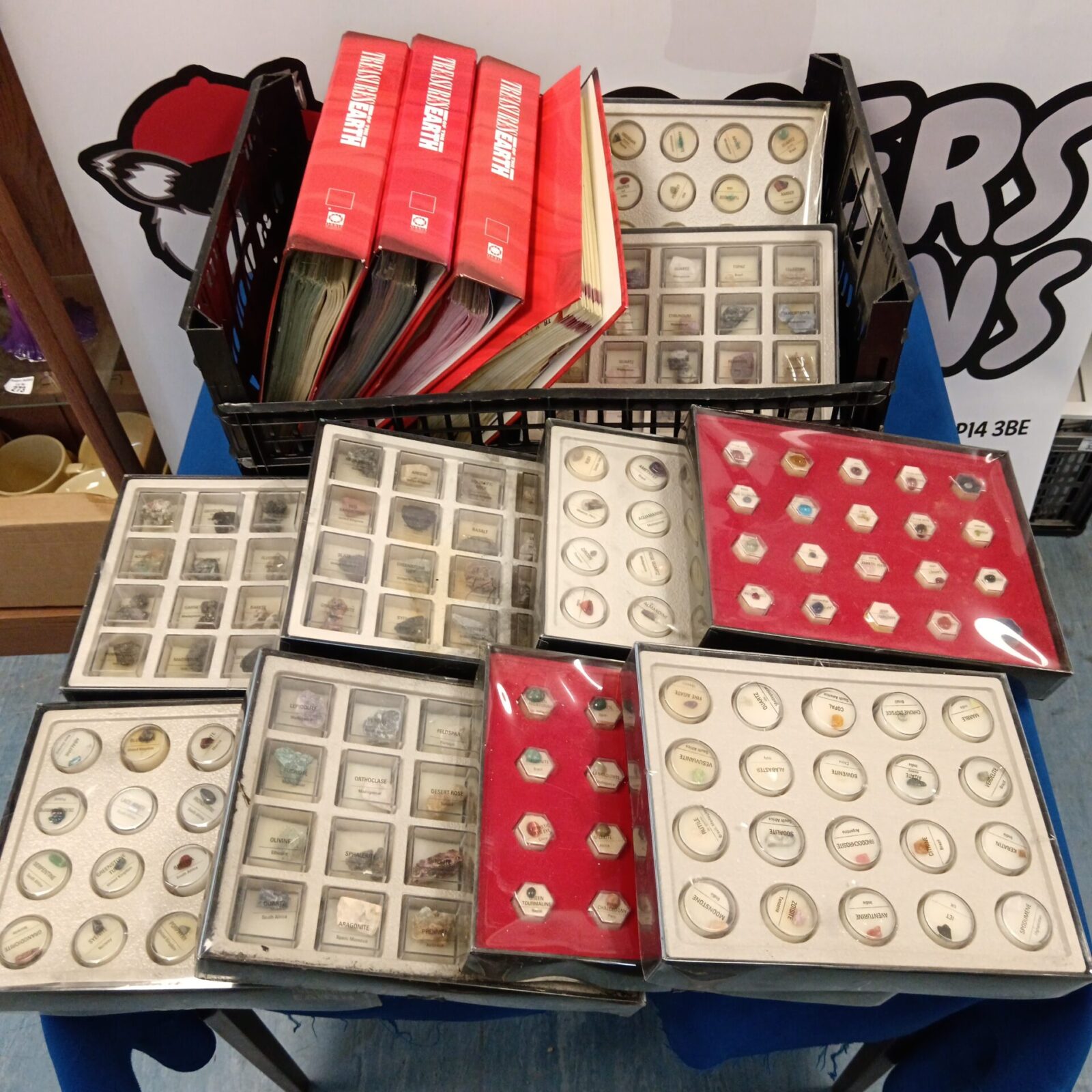 Overview of Treasure Earth gemstone and magazine collection.