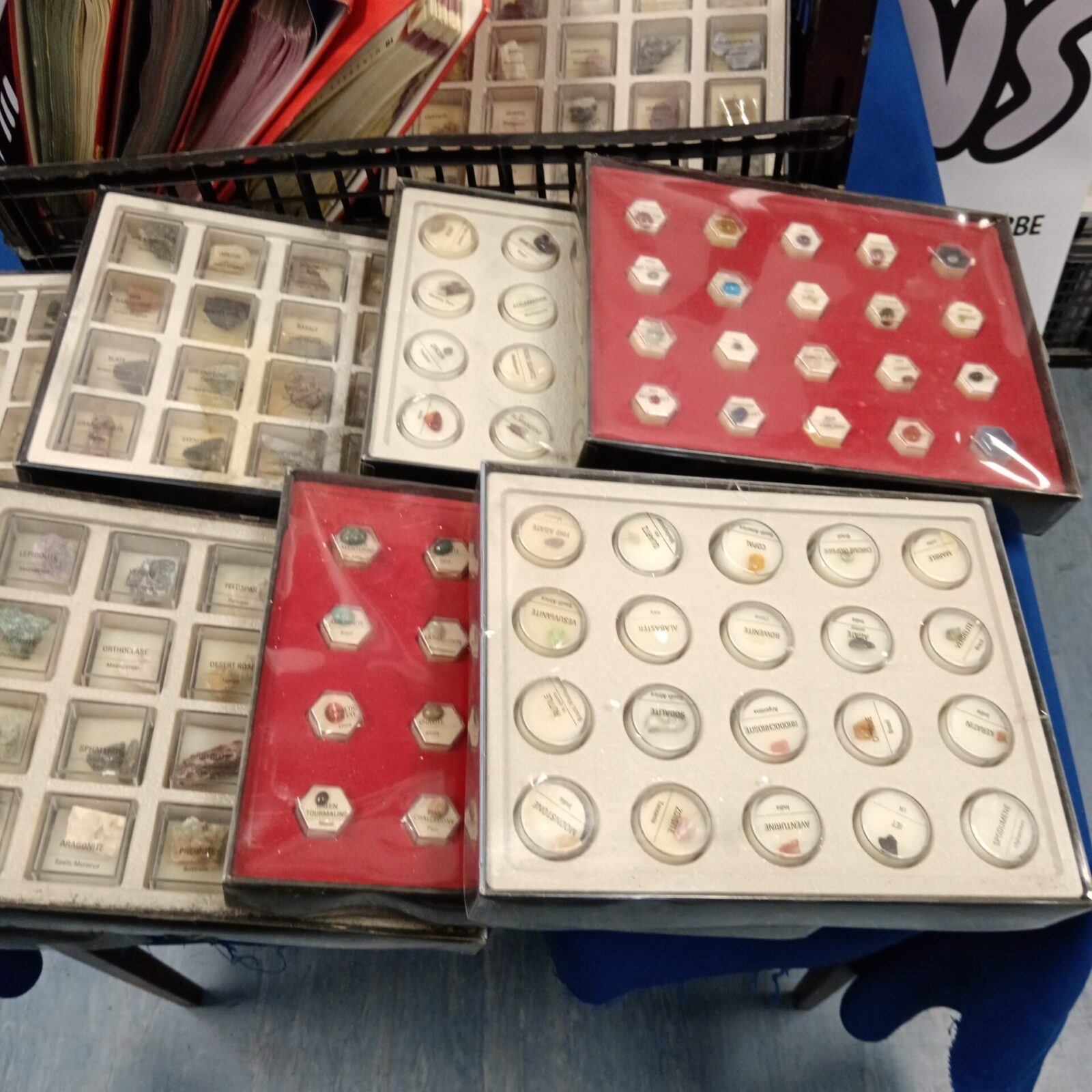 Treasure Earth magazine binders stacked on a table.