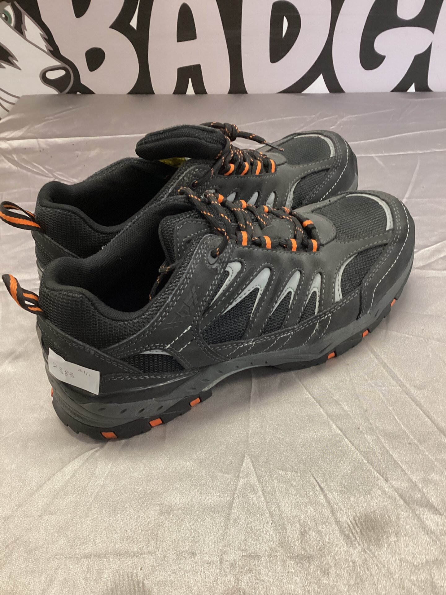 Black and orange size 9 Trojan safety shoes for work.