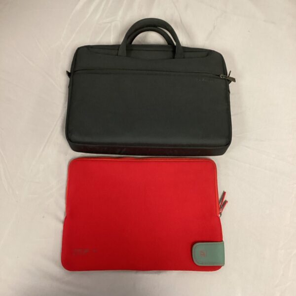 Black Tucano laptop bag for computer protection and travel.