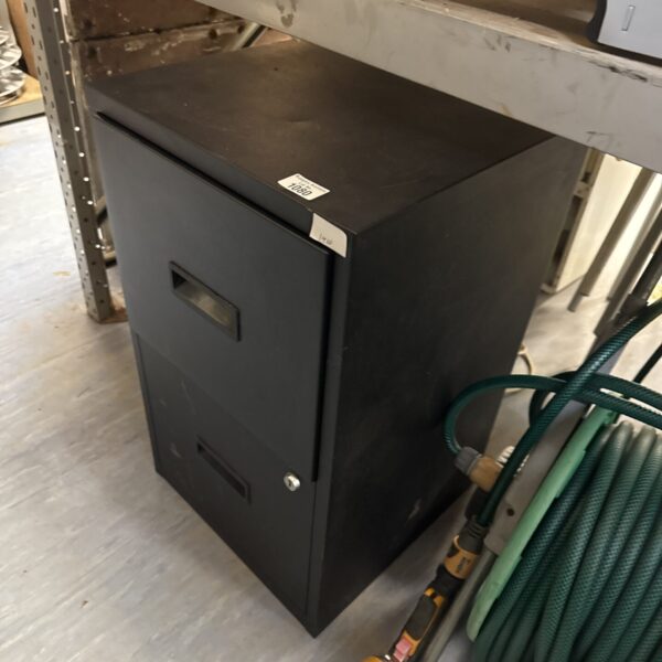 Vintage two-drawer metal filing cabinet for office storage.