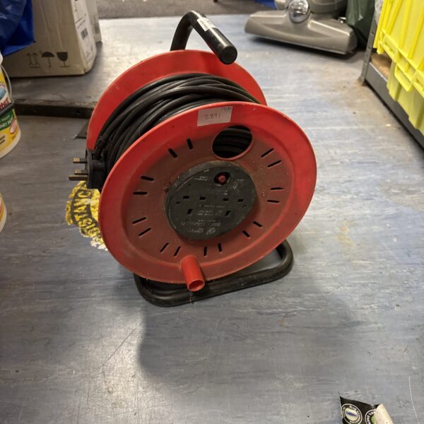 Red two-gang extension reel with cable wound around it.