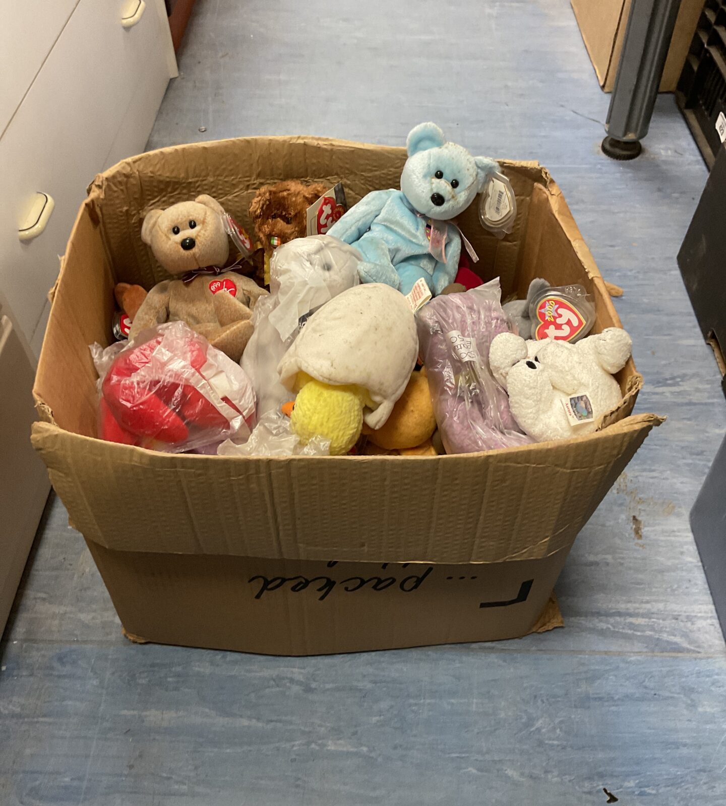 Large lot of vintage Ty Beanie Babies with tags.