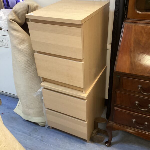 Pair of wooden under desk cabinets for office storage.