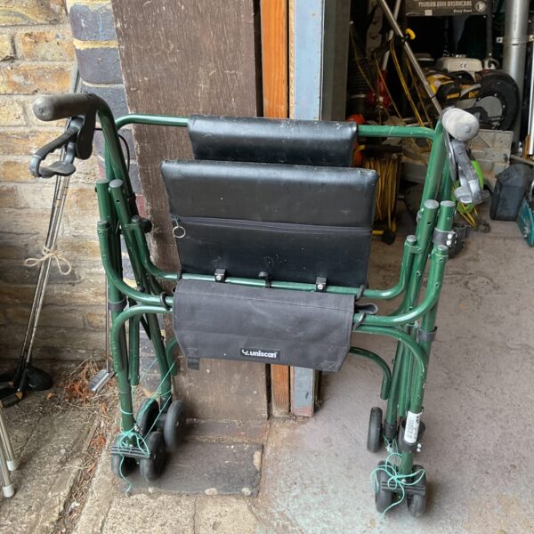 Large and wide Unis mobility walker with seat and basket.