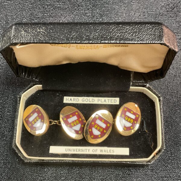 Vintage University of Wales cufflinks with crest detail.