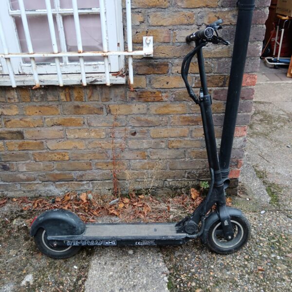 Black Urban XH1 electric scooter, foldable personal transport.