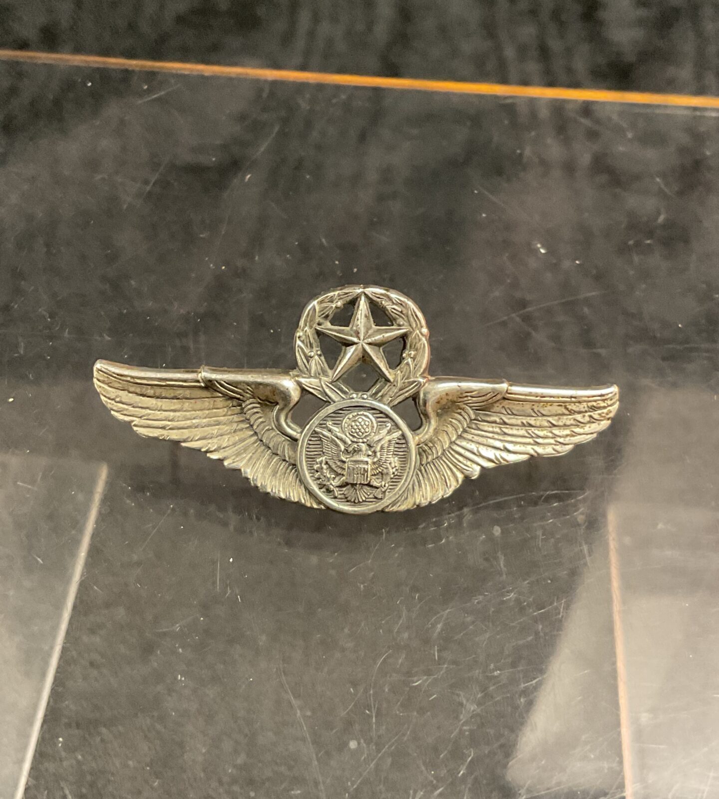 Detailed front view of a vintage USAF Master Aircrew Badge in sterling silver.