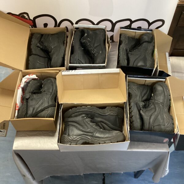 Lot of six pairs of used safety shoes for work.