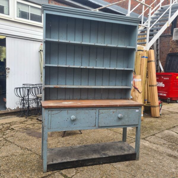 Large Victorian welsh dresser with painted finish and shelving.