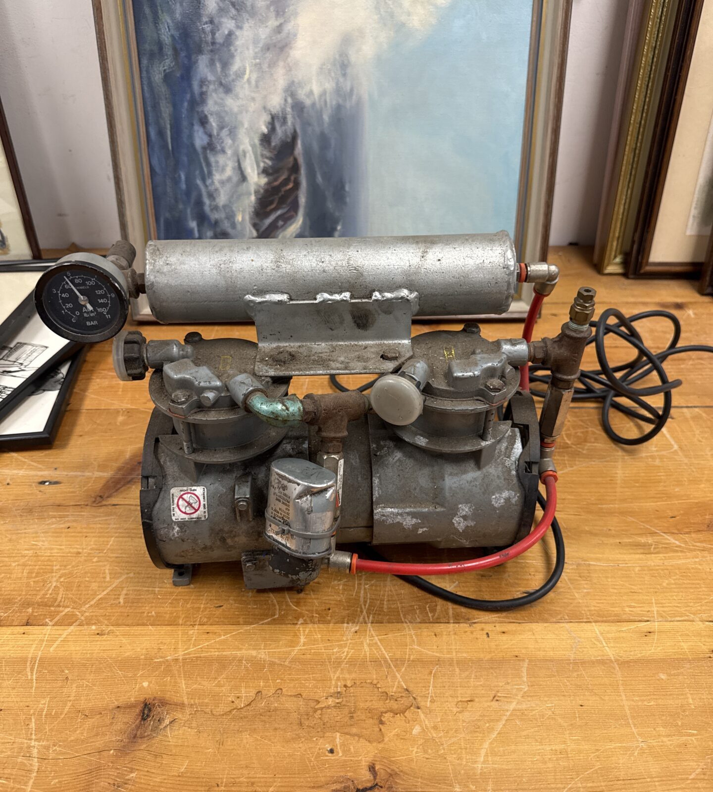 Vintage air compressor, built by a former Broom & Wade employee, in working condition.