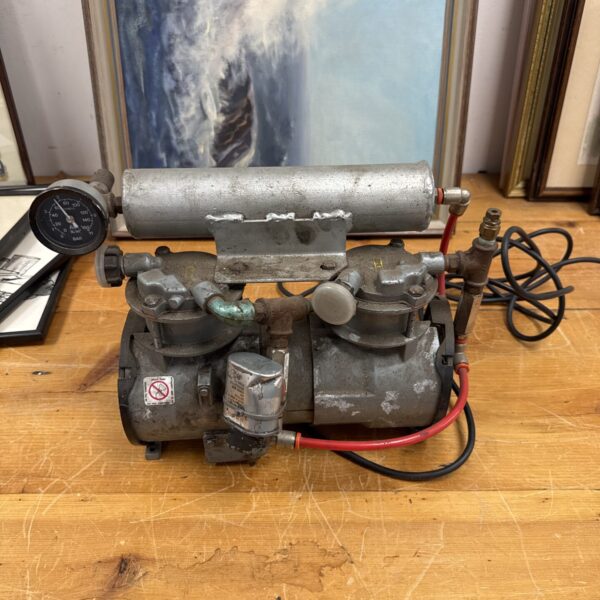 Vintage air compressor, built by a former Broom & Wade employee, in working condition.