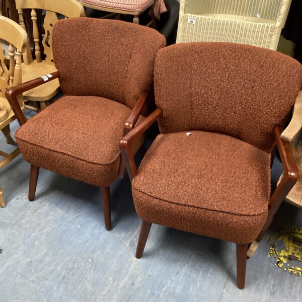 Vintage arm chairs, a pair of mid-century retro seating.