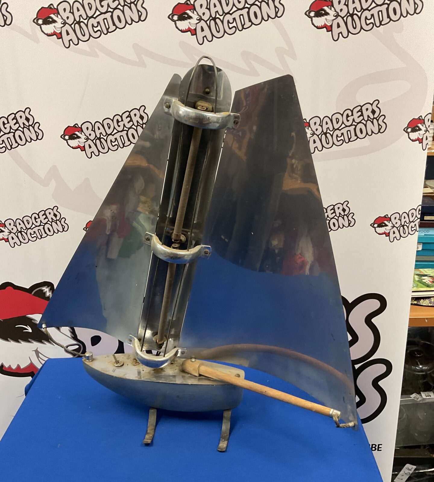 Vintage Art Deco yacht heater with polished metal finish.