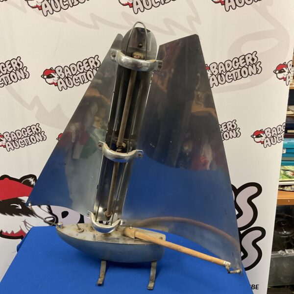 Vintage Art Deco yacht heater with polished metal finish.