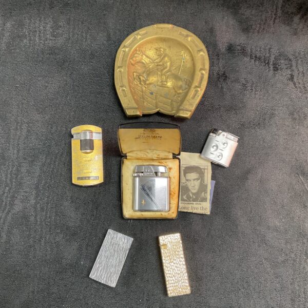 Vintage brass ashtray and collectible lighters lot.