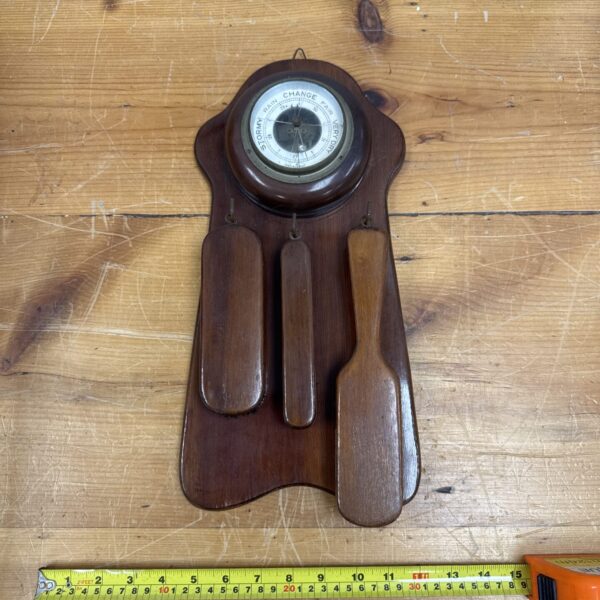 Vintage 1940s mahogany barometer and clothes brush wall hanging.
