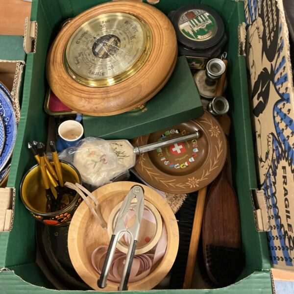 Vintage barometer with mixed lot of collectibles and curios.