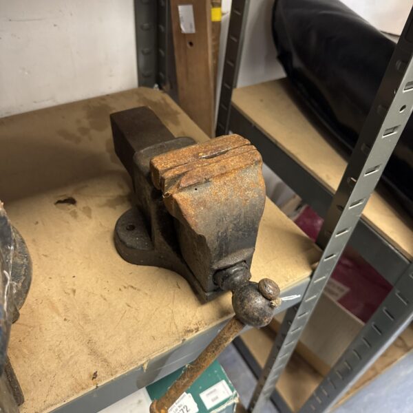 Vintage bench vice for metalworking and workshop use.