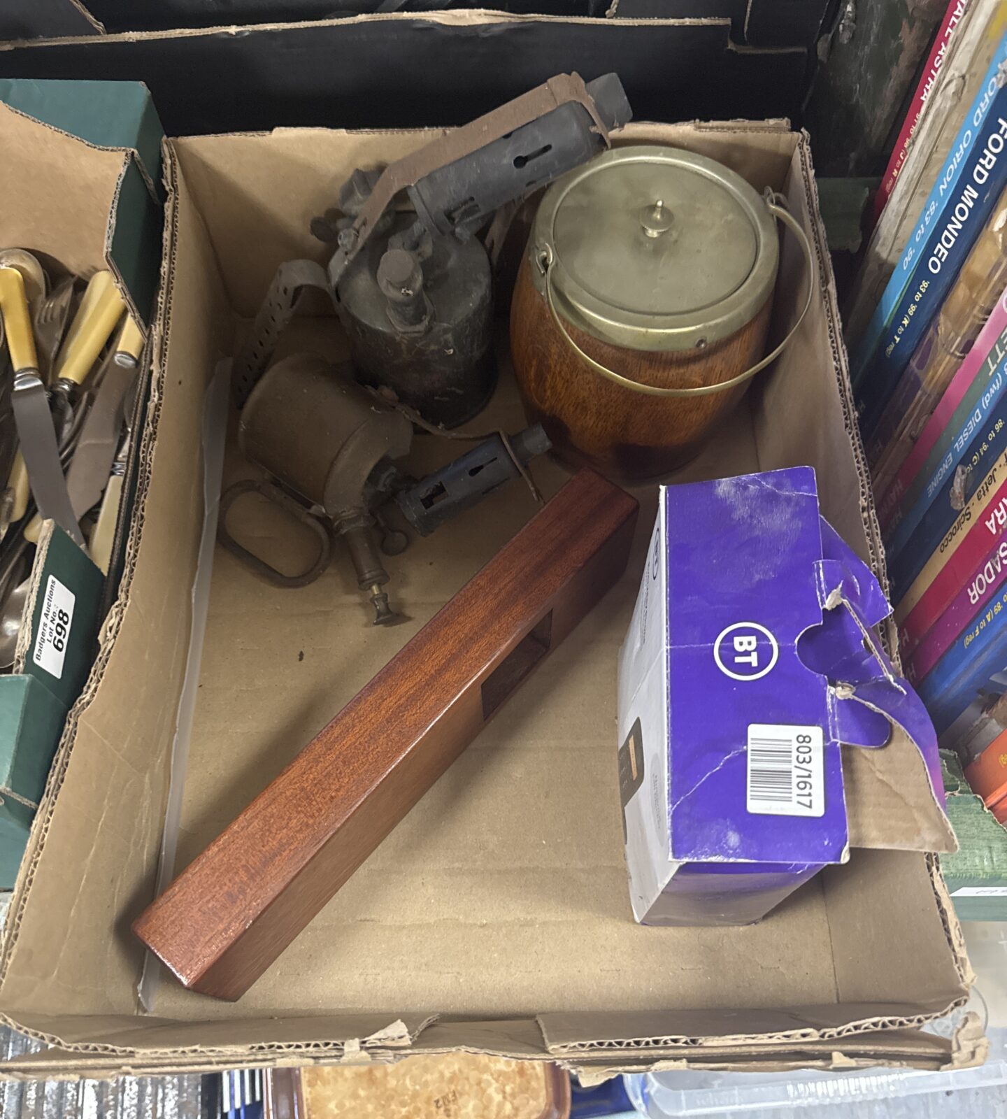 Vintage blowtorch collection with brass and wooden handles.