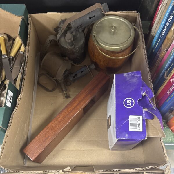 Vintage blowtorch collection with brass and wooden handles.