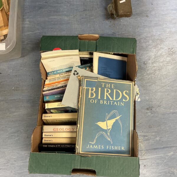 A stack of vintage books including Birds of Britain.