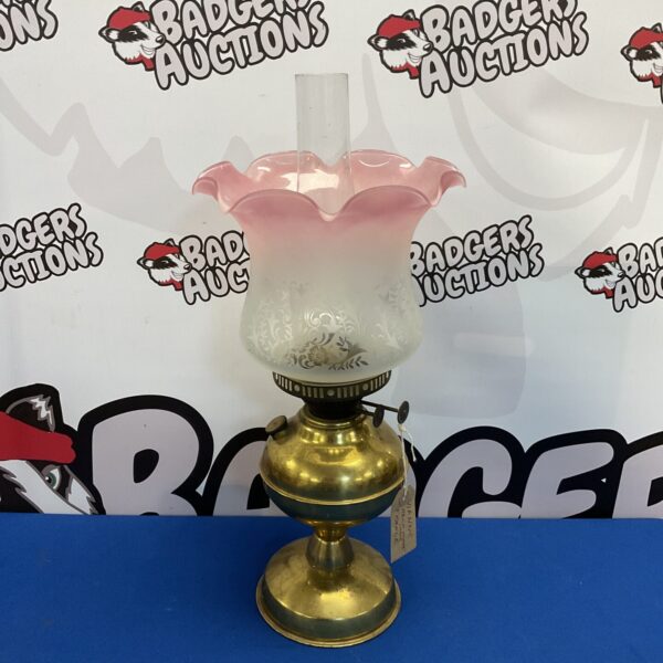 Vintage brass paraffin lamp with French glass shade, antique lighting.