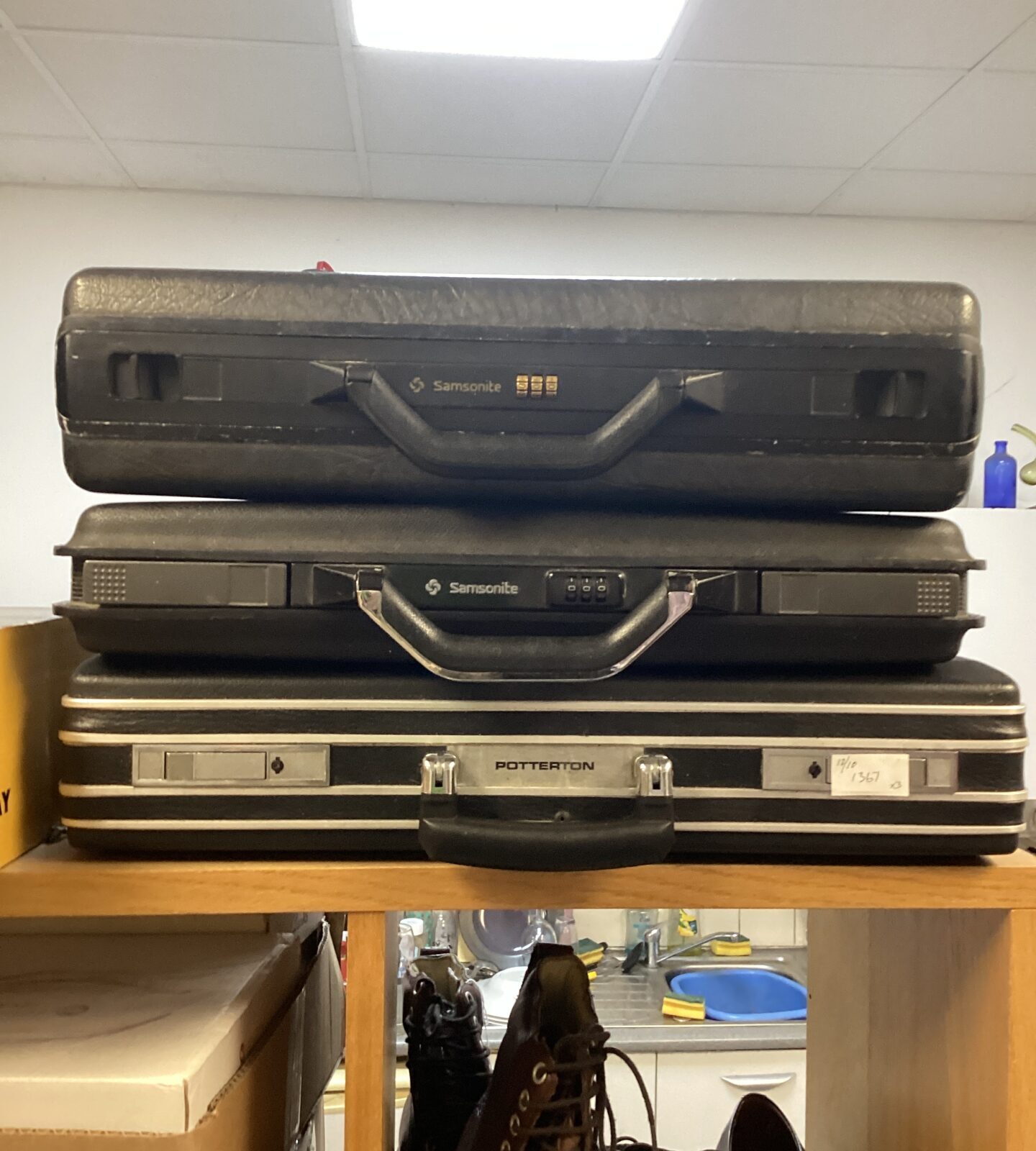 Vintage lot of three briefcases including Samsonite and Potterton.
