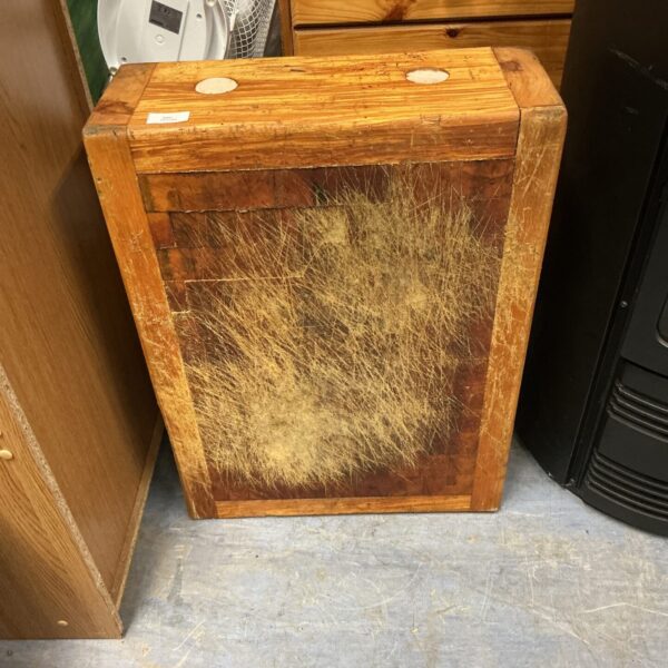 Vintage wooden butcher block for kitchen food preparation.