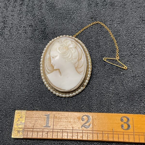 Vintage cameo brooch with seed pearls in gold filled setting.