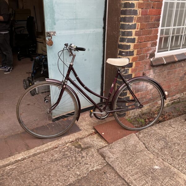 Maroon vintage Cameo ladies bicycle with step-through frame.