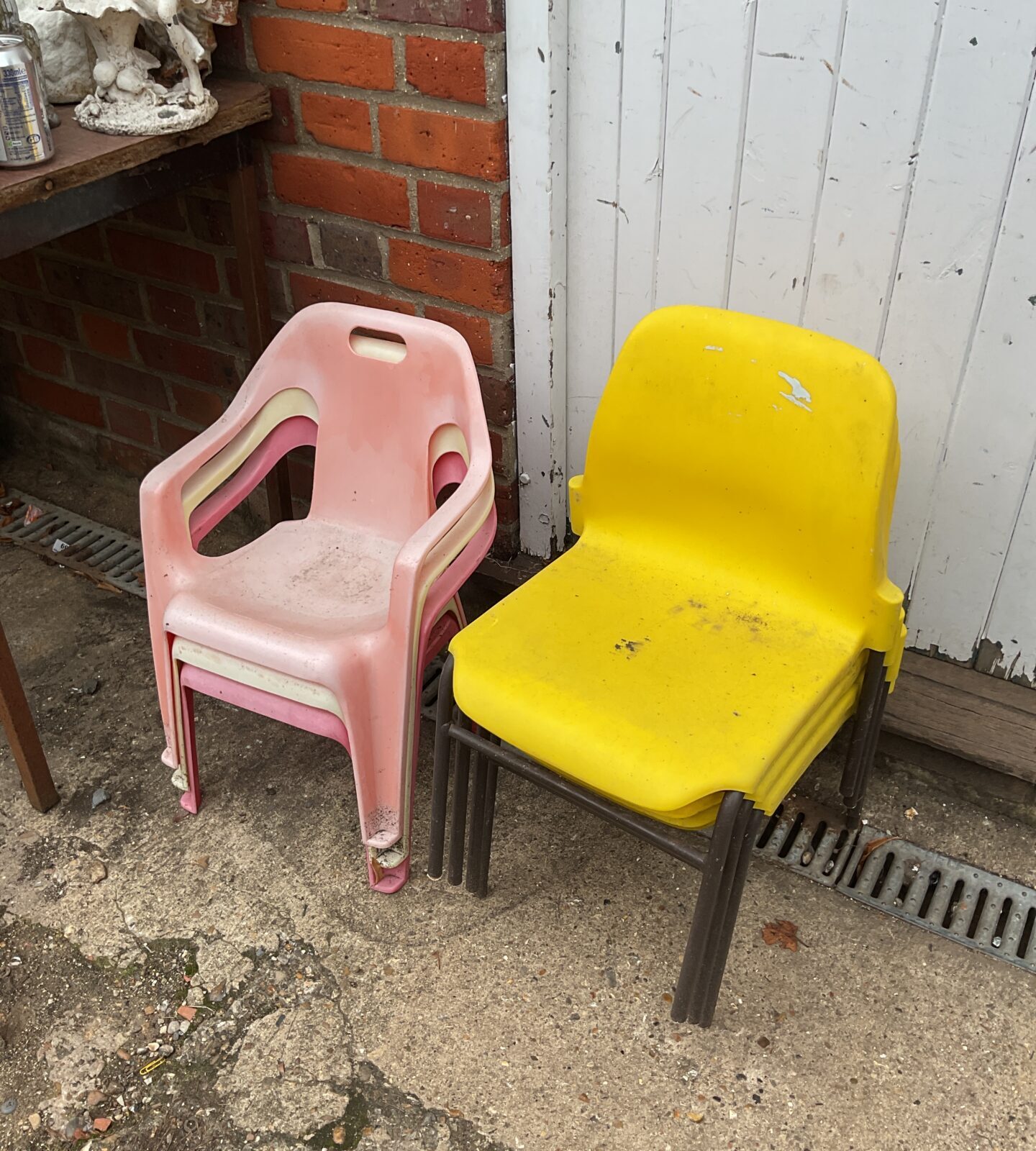 Vintage childrens stacking chairs in bright colours.
