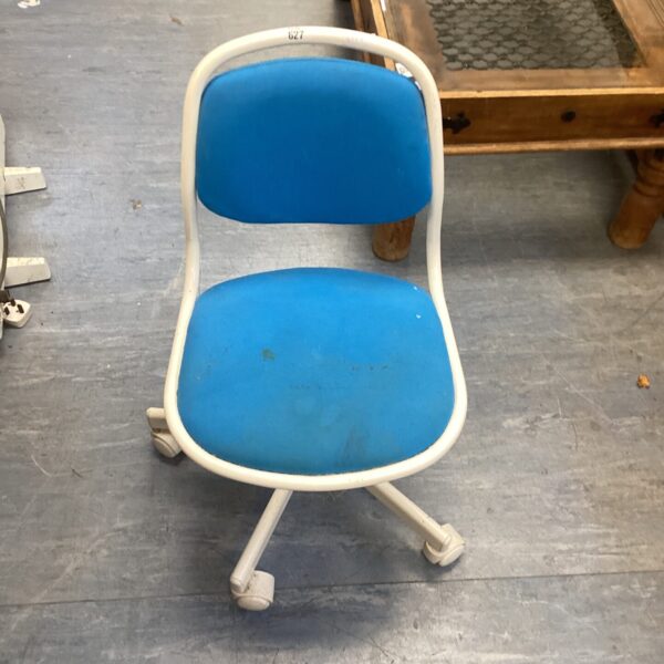 Bright blue vintage child's swivel chair on caster wheels.