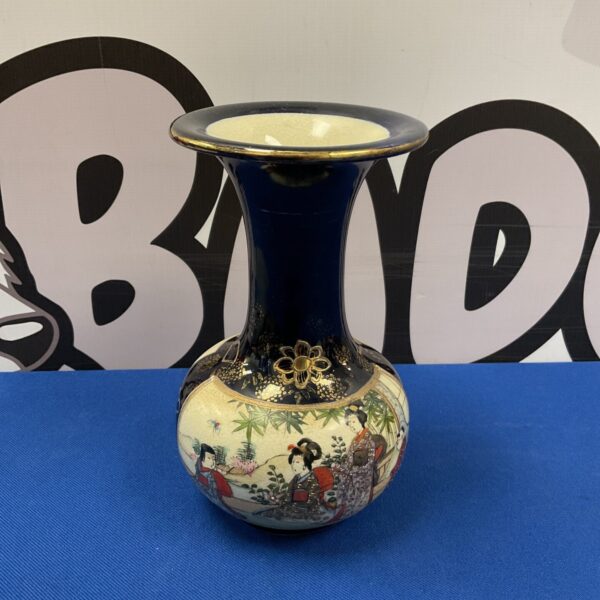 Vintage Chinese vase with black glaze and hand-painted figures.