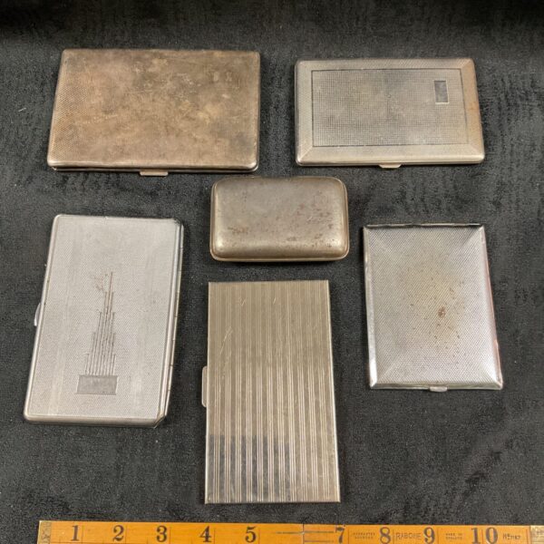 Lot of six vintage silver tone cigarette cases.