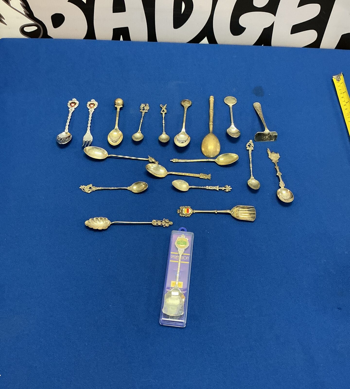 Lot of vintage collectors teaspoons with decorative finials.