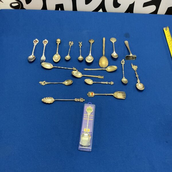 Lot of vintage collectors teaspoons with decorative finials.