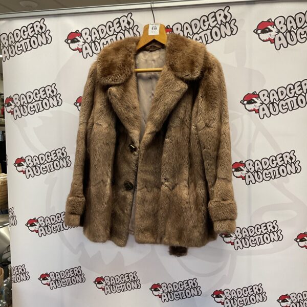 Brown vintage coney fur jacket, 1970s style.